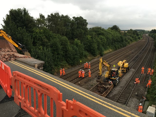Train service resumes following bridge collapse in Leicestershire: Network Rail engineers on site repairing a collapsed bridge in Barrow upon Soar, Leicestershire