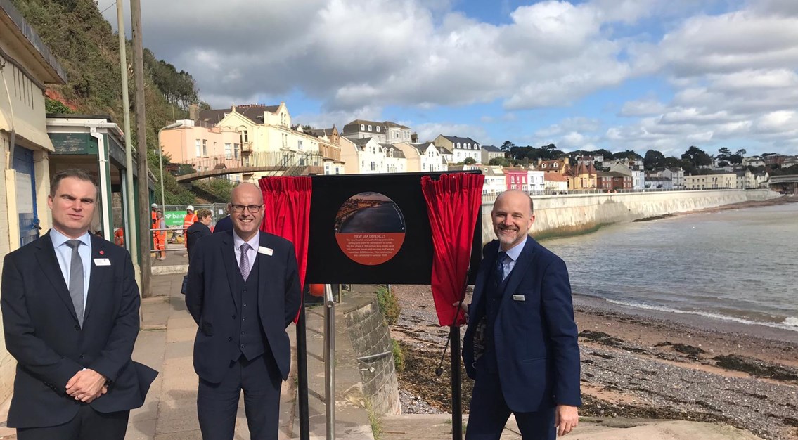 Mike Gallop (middle), Network Rail Western route director, at the first section of the new Dawlish sea wall: Mike Gallop (middle), Network Rail Western route director, at the first section of the new Dawlish sea wall