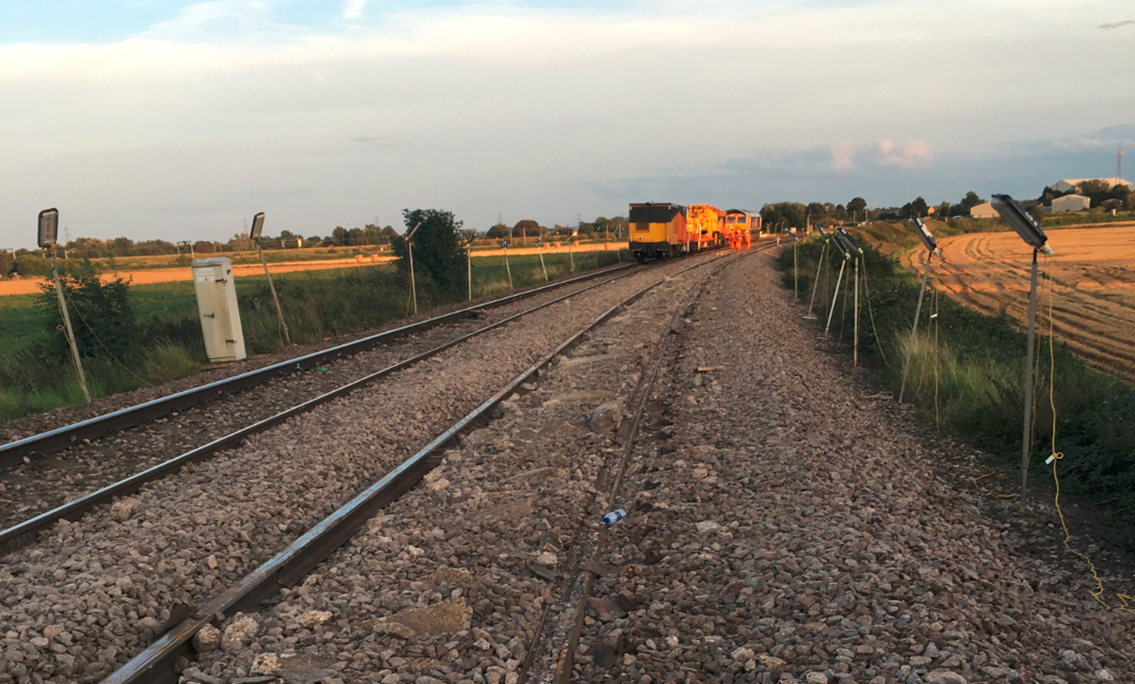 Derailed wagons cleared from the line at Ely as engineers begin to replace the tracks: Engineers start work to replace broken track
