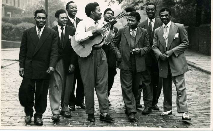 Alford Gardner Leeds Award: Alford Gardner (on guitar) c. 1953 in Hyde Park Leeds with early members of the Caribbean Cricket Club which he co-founded with fellow Jamaican WW2  veterans Charlie Dawkins, Glen English and Errol James in 1948. Photo: Yorkshire Evening News (now defunct)