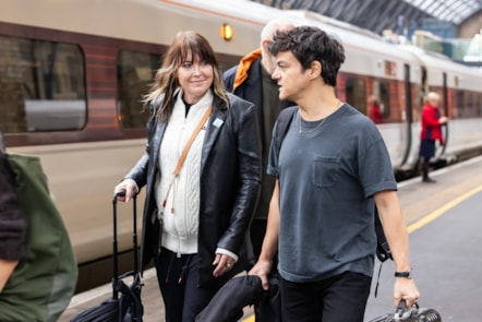 Mercury Prize judges walking along LNER platform