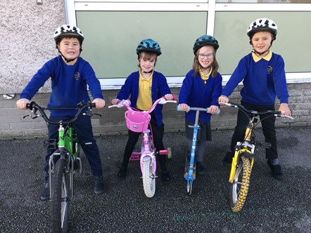 Cullen Primary School pupils celebrate Gwen Mayor Memorial Trust funding for new cycling helmets.

L-R:  Brodie McKandie, Darcy Farren, Freya Murray and Samson Irwin