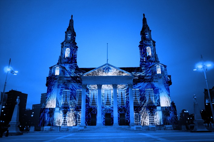 Light Night 2023: The iconic white facade of Leeds Civic Hall will see the return of one of Light Night’s most popular projections, with the building acting as the backdrop for Theatre of Illumination by artist Will Simpson.
Originally commissioned for the 2014 event, the mesmerising digital spectacle features a series of 3D optical illusions and projection mapping, combined with a thrilling soundtrack which together, will take visitors on a journey through time and space.