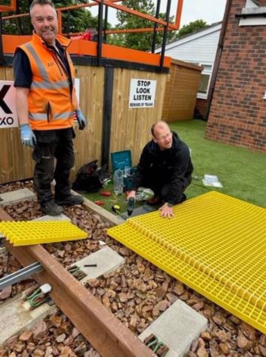 This images shows the Heaton team installing the crossing