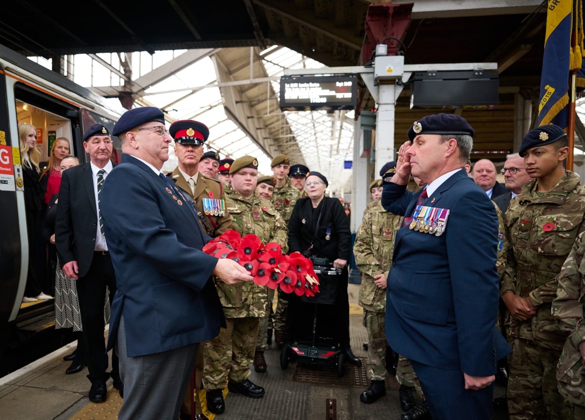 Andrew Walker of Avanti West Coast salutes Steve Brammer of the RBL.