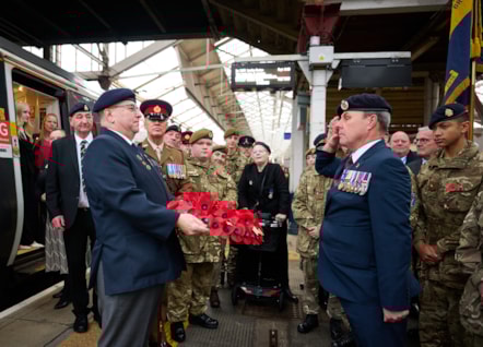 Andrew Walker of Avanti West Coast salutes Steve Brammer of the RBL.