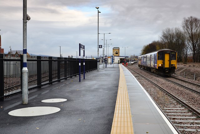 A Northern train leaving Rochdale heading to Manchester seen from the new platform 4