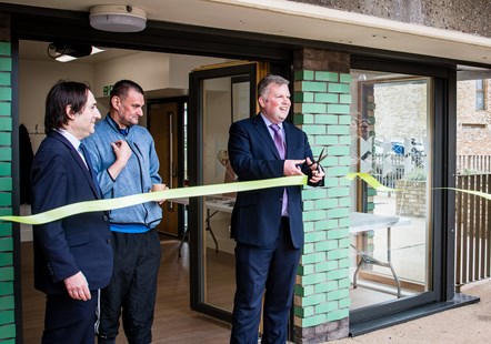 Celebrating new council homes at Dover Court Estate - picture of (left to right) Cllr Nick Wayne, local resident John Lowe and Cllr Diarmaid Ward, Executive Member for Housing and Development