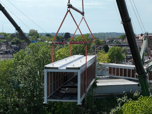 Cross section of footbridge being lifted into place at Hither Green: Cross section of footbridge being lifted into place at Hither Green