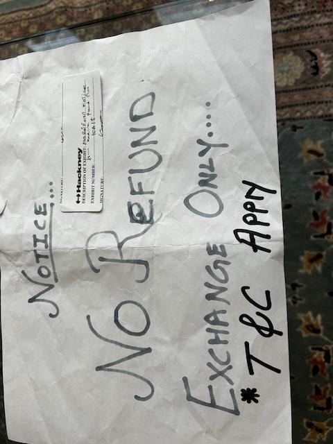 'No refunds' sign