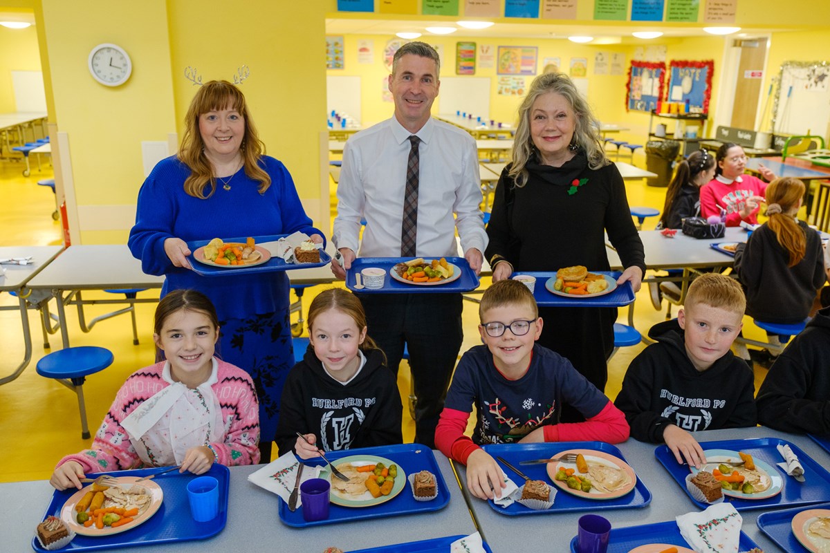 Cllrs Cowan, Barton and McKay enjoy a Christmas school lunch