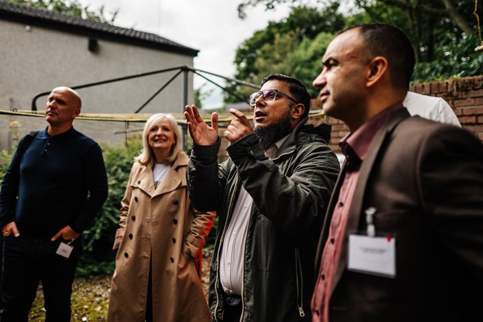 Holtdale 2: Leeds City Council technical officer Zahir Mohammed shows guests, including West Yorkshire mayor Tracy Brabin and Councillor Mohammed Rafique, around the Holtdale estate in Holt Park, Leeds.