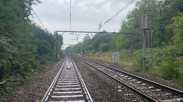 Cleared track after flood water subsided from burst water main in Audenshaw