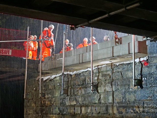 Laying the 1st cil beam in the rain Taylor's bridge Todmorden