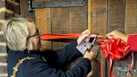 The Mayor of Dudley, Cllr Hilary Bills, cuts the ribbon to reopen the Cone