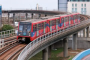 TfL Image - DLR train approaching Canning Town: TfL Image - DLR train approaching Canning Town