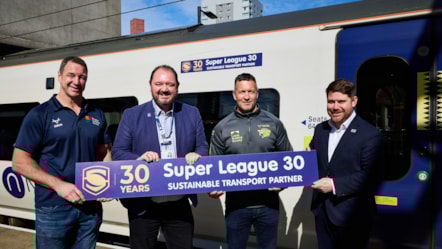 Adrian Morley, Danny McGuire, Alex Hornby and Bobby Bahadori with the Super League 30 train