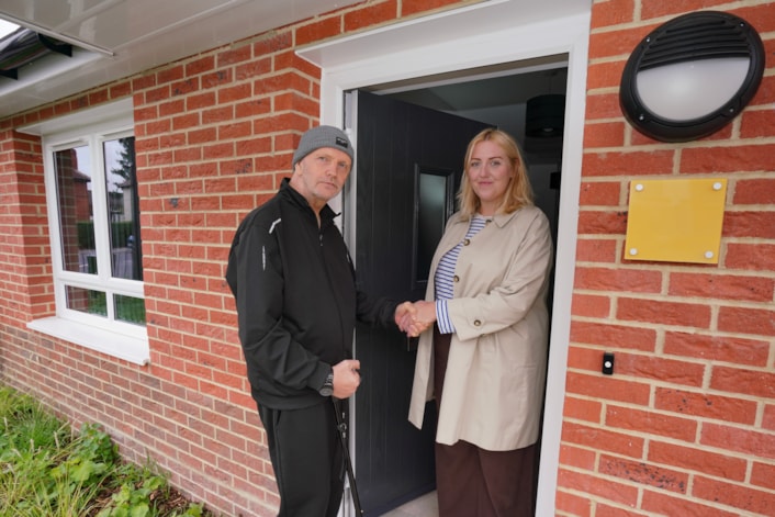 Ambertons 1: Councillor Jess Lennox, Leeds City Council’s executive member for housing, with tenant Paul Bennett at his new home on Amberton Terrace.
