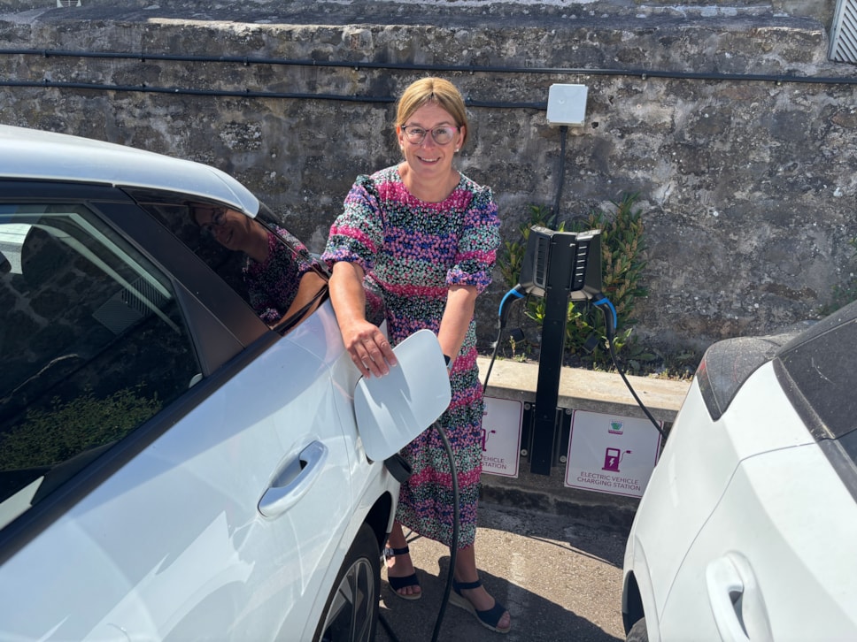 Moray Council Leader, Cllr Robertson with EV charger