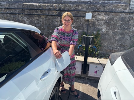 Moray Council Leader, Cllr Robertson with EV charger