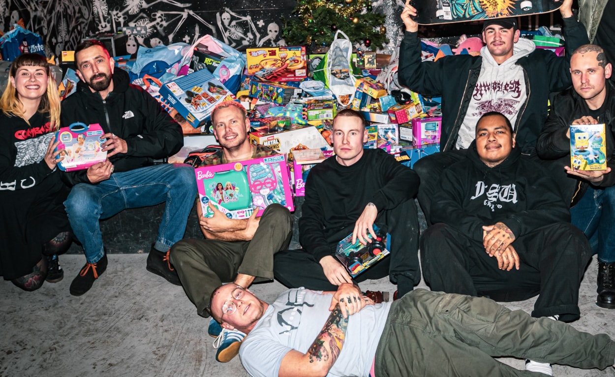 CFL Christmas appeal 1: Hardcore music fans brought over 600 toys to a gig at Boom Leeds to be donated to the Child Friendly Leeds gift appeal. Organiser Arran Gordon pictured fourth from the right. Picture credit: Amy Dorsman