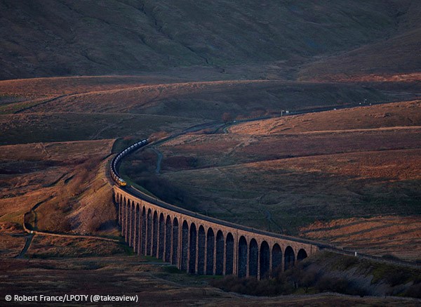 Winner of the Network Rail Lines in the Landscape award, 2015 Take-a-View Landscape Photographer of the Year - Freightliner Coal Train, Ribblehead Viaduct, North Yorkshire ©Robert France: Image to be used only in conjunction with Landscape Photographer of the Year Awards