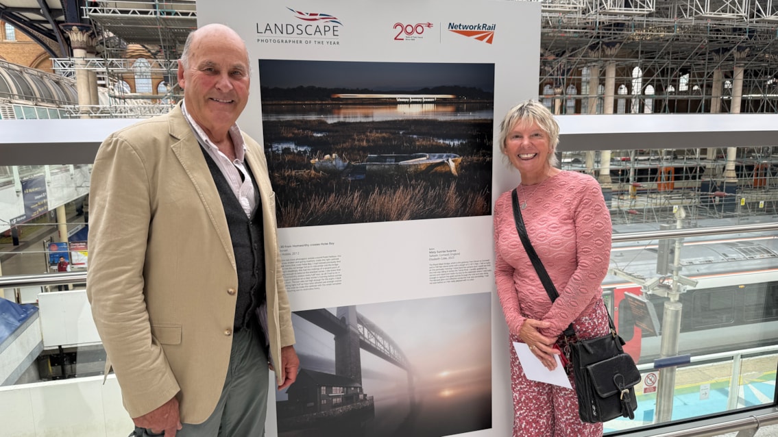 Founder of Landscape Photographer of the Year, Charlie Waite, with photographer Elizabeth Coles and her featured photo in the exhibition (below)