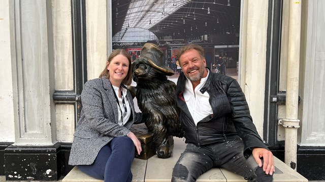 Paddington Bear returns to Platform 1: Susan Evans, Network Rail's Head of Stations and Passenger Experience, and Martin Roberts with the Paddington Bear statue at London Paddington