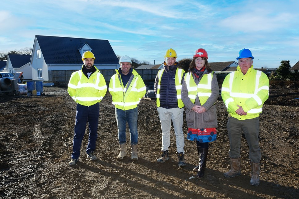 Cllrs Bethan Price and Jon Harvey with contractors on Glasfryn building site