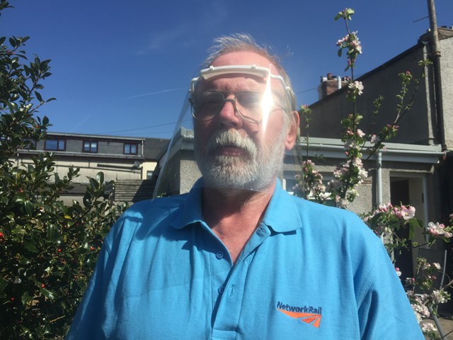 Network Rail signaller Gary Knight wearing one of his 3D printed visors