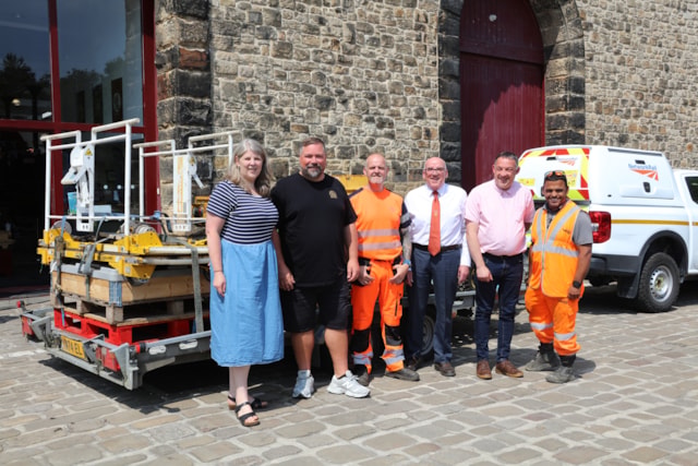 Network Rail's Clare Waller and ELR chair Mike Kelly with staff from both organisations: Network Rail's Clare Waller and ELR chair Mike Kelly with staff from both organisations