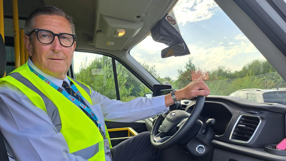 CC Warren Goldsworthy, cabinet member for Highways and Transport behind the wheel of one of LCC's new SEND minibuses cropped