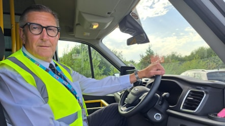 CC Warren Goldsworthy, cabinet member for Highways and Transport behind the wheel of one of LCC's new SEND minibuses cropped
