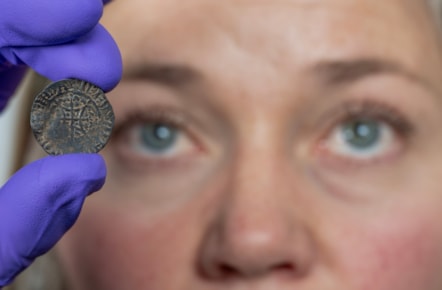 Curator Alice Blackwell inspects the David I penny. Image © Neil Hanna (3)