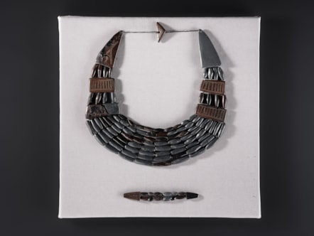 Bronze Age jet necklace discovered at Balgay. Image © National Museums Scotland