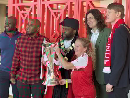 Islington councillors pose with the Women's Champions League trophy