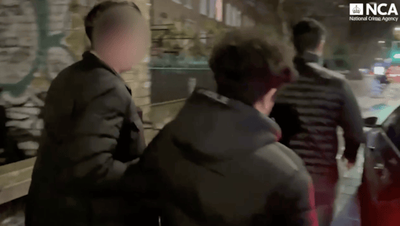 Fugitive members of small boat people smuggling network who transported thousands and sexually abused migrants arrested: 181224 arrest still
