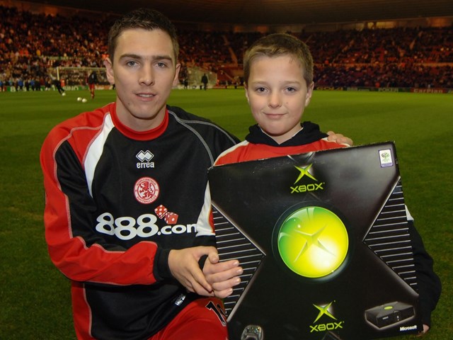 No Messin'! at Middlesbrough FC 1: Kieran Nugent receives his Xbox from Stewart Downing