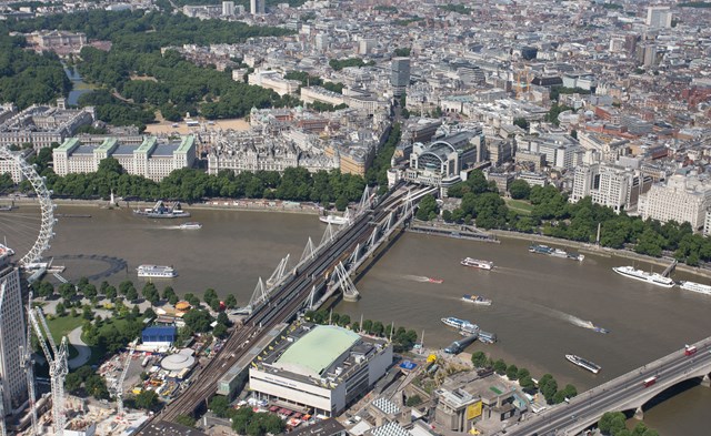 aerial - Charing Cross: Charing Cross, with Hungerford Bridge and the twin Golden Jubilee footbridges. The Royal Festival Hall is at bottom, with Buckingham Palace to the top left and Waterloo Bridge bottom left