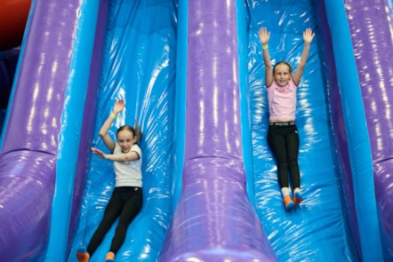 Children enjoying the inflatable zone at Sobell Leisure Centre