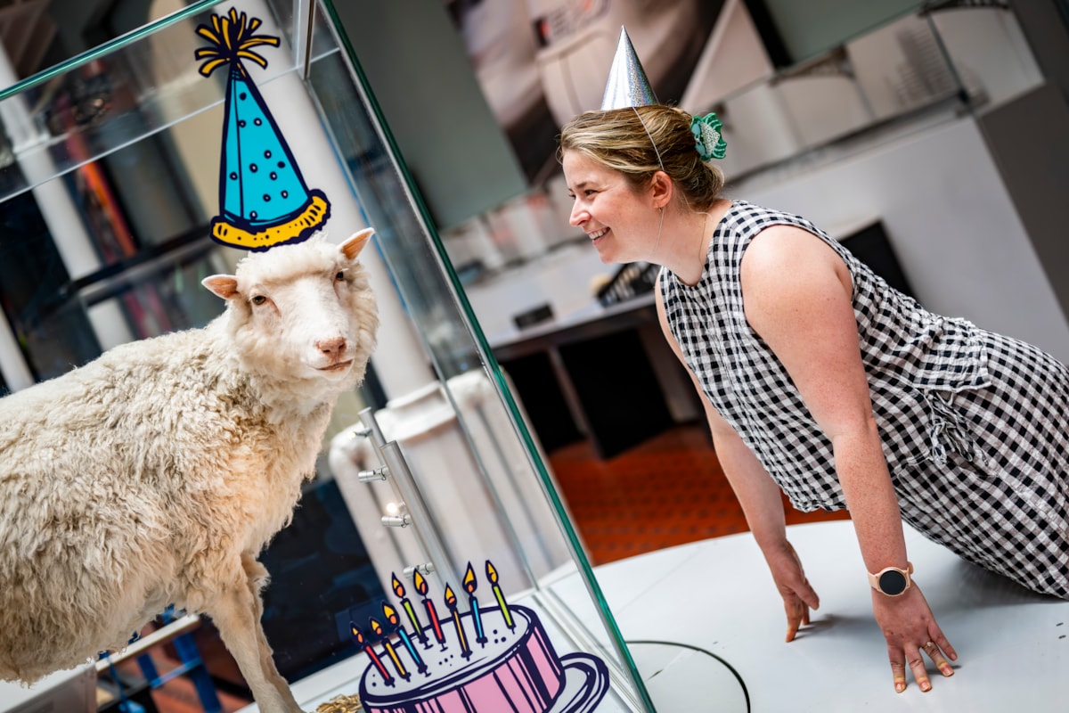 Curator Sophie Goggins with Dolly the sheep. Image © Andy Catlin