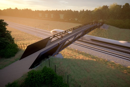 HS2 reveals first rural footbridge design: HS2 rural footbridge design with passing train