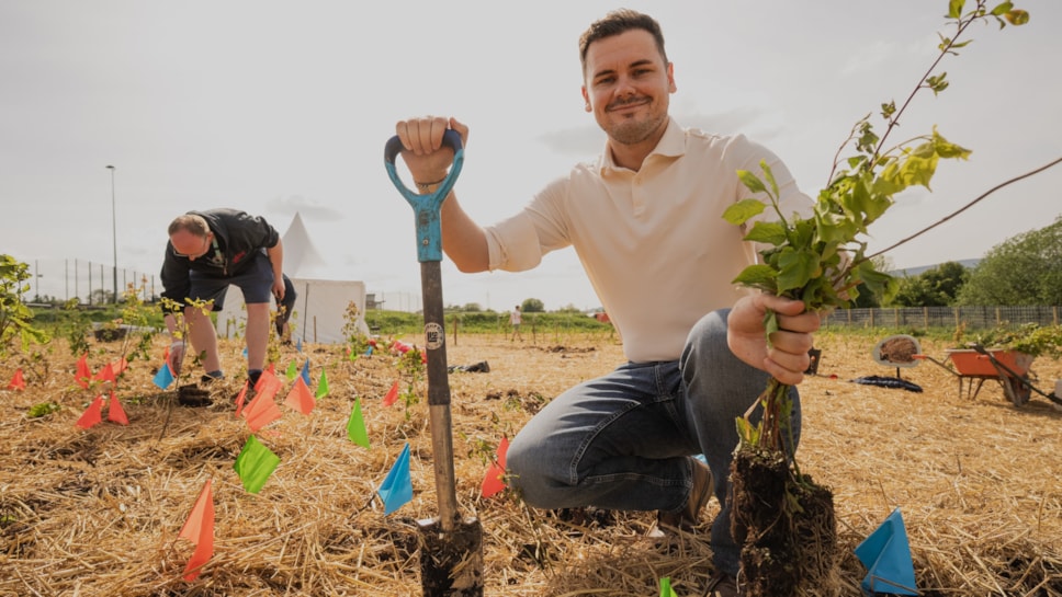 Cllr Joshua Roberts helps to plant the new microwood in Colne (1)