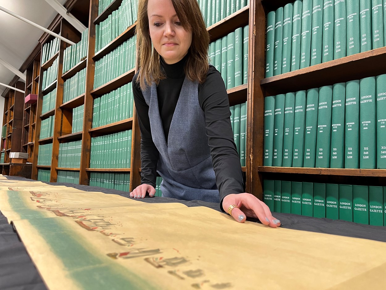 Leeds Central Library's naval battle: Leeds Central Library's senior librarian Rhian Isaac with sections of the step-by-step, illustrated account of the battles of Solebay and Texel which took place in the 1670s. Estimated to be more than 50 feet in length, the document itself dates from around 1908 and is among a collection of more than 3,000 books, pamphlets and periodicals donated by noted Leeds aristocrat, diplomat and naval history buff Sir Alvary Gascoigne.