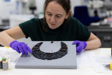 Conservator Bethan Bryan works on the Balgay necklace.  Photo © Duncan McGlynn (1)