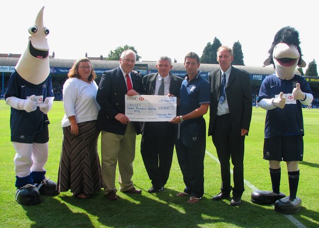 SOUTHEND FOOTBALL FANS GIVE RAILWAY CRIME THE RED CARD: Southend United Cheque Presentation