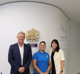 Phil Bentley, CEO, Mitie, Priscila De Paula, a colleague in the Mitie Cleaning Team and Kathryn Dolan, CPO, Mitie photographed celebrating Mitie's Royal Warrant: Phil Bentley, CEO, Mitie, Priscila De Paula, a colleague in the Mitie Cleaning Team and Kathryn Dolan, CPO, Mitie photographed celebrating Mitie's Royal Warrant