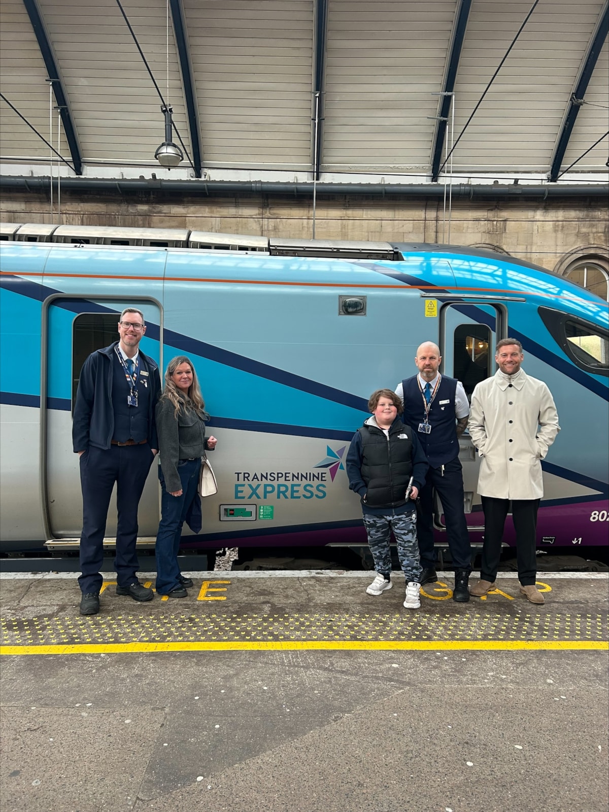 From L-R Matty Walton, Conductor, Mylo's mum Kellie, Mylo, Nathan Whale, Trainee Conductor, and JJ Fletcher, Area Customer Experience Manager