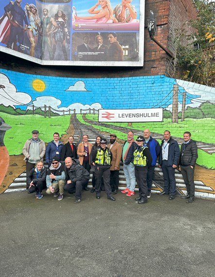 This image shows the celebration of the new mural at Levenshulme
