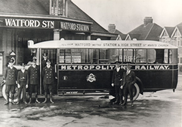 Customers invited to join celebration of Croxley and Watford stations’ centenary on the Metropolitan line: LTM Image - Exterior of Watford station with Metropolitan line car 1927 (c) TfL from London Transport Museum's collection
